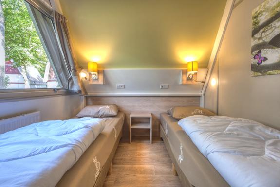 Slaapkamer in een bungalow | Bospark 't Wolfsven